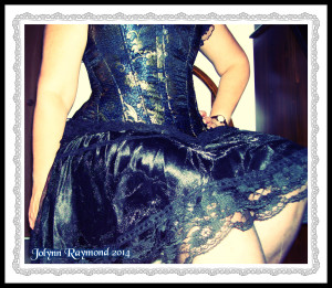 Blue and gold corset with lace frame