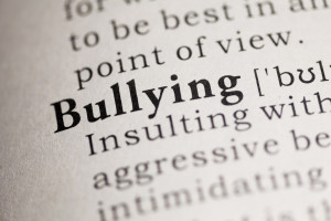 Dictionary definition of the word Bullying.